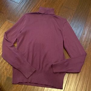 Purple turtleneck sweater